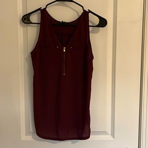 Maroon sleeveless blouse with gold zipper and accents  Size Small